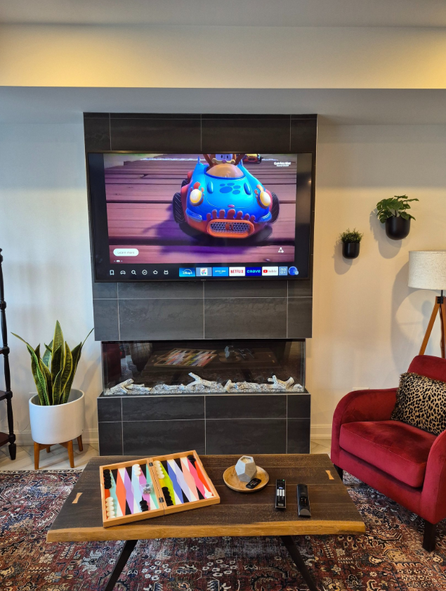 TV mounted on a modern tiled fireplace in Ottawa